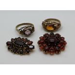 1 Brosche GG 14ct. lt. Zertifikat 1989: Anfertigung Juwelier HOHENBERGER, mit Granatcabochons zus. c