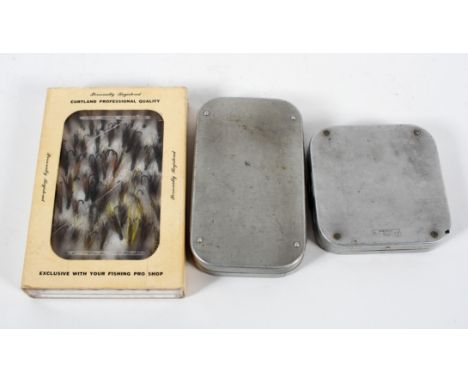  A vintage Wheatley metal fly box, of shaped rectangular form, another of shaped square form containing some salmon flies, to