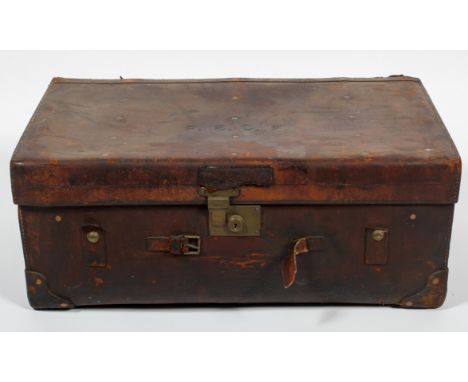 An Insall leather vintage travelling trunk, stamped 'INSALL/MAKER/BRISTOL', the brass mounted leather handles stamped, the to