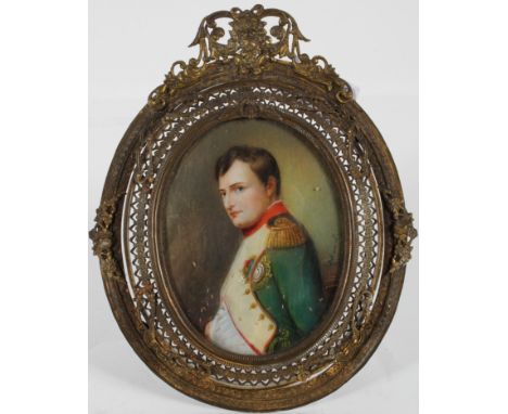 An oval miniature portrait Napoleon, signed N David, in pierced gilt strut frame, Image 8cm x 6cm, frame 14cm.