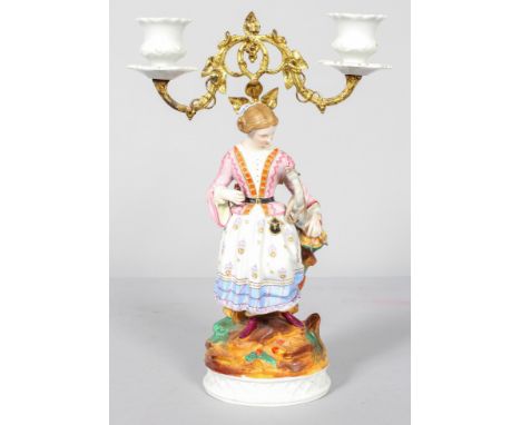 A French biscuit gilt metal mounted twin-light candelabra, late 19th century, impressed S+S2 marks, the gilt metal branches c