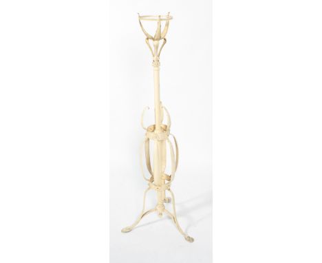 A white painted metal jardiniere stand, in the Arts &amp; Crafts style, of Ernest Gimson, or oil lamp stand, circa 1900, with