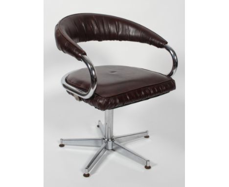 A 1970's vintage swivel desk chair, with tubular chromed frame and faux leather  upholstery, possibly by Giotto Stoppino