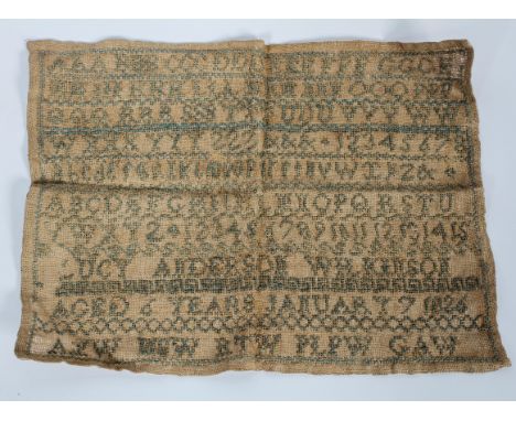 A Victorian needlework sampler, by Lucy Anderson Wilkinson, Aged 6 years, January 7 1826, embroidered in blue thread with the