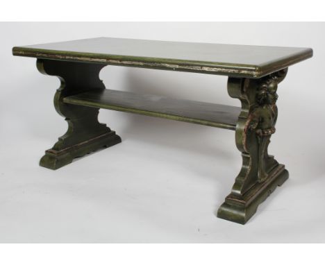 A Renaissance style coffee table, with figural carved legs and shelf stretcher, green painted with gilt highlights, 60cm high