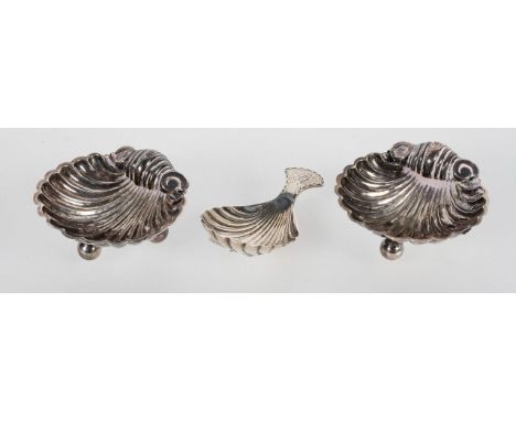 A George III silver caddy spoon with ornate shell shaped bowl, hallmarked London 1801, possibly by Elizabeth Morley, together