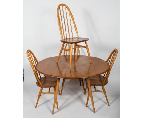 Lucian Ercolani - Ercol - Windsor - A 20th Century retro vintage beech and elm round drop leaf dining table on angled square 