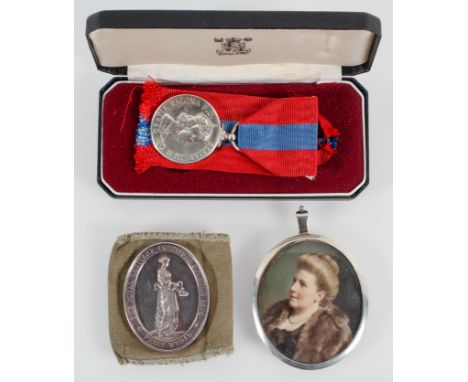 An Imperial Service Medal, awarded to Wilfred John Whale, a silver Royal Sanitary institute prize medal and a photograph port