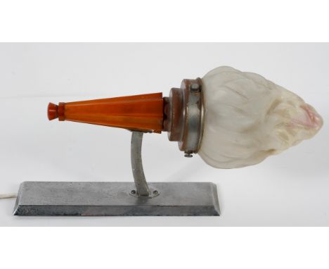 A 1920's Odeon light with tapered fluted Bakelite base and an acid etched flamiform shade, on a chromed back plate, 36cm high