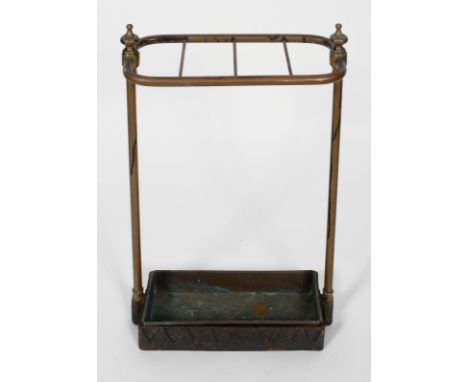 A Victorian painted brass stick stand, with tin drop tray, 62cm high x 38cm wide