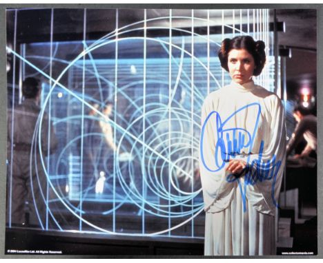 Star Wars - Carrie Fisher (1956-2016) - Princess Leia - an autographed officially licensed 8x10" colour photograph of Fisher 