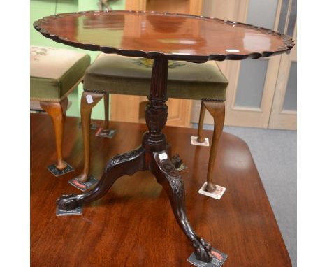 A George III mahogany piecrust tilt tip tripod table 