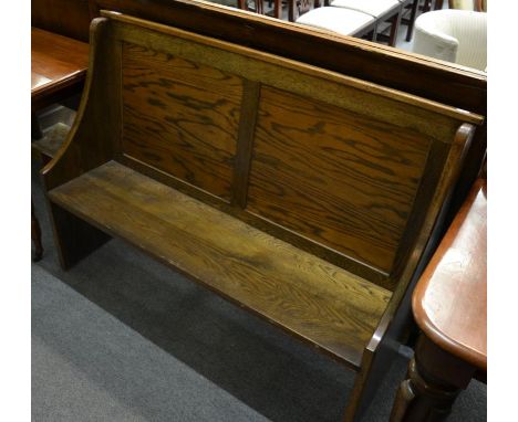 A late Victorian oak bench 