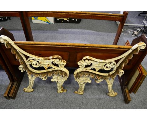 A pair of Victorian cast iron bench ends