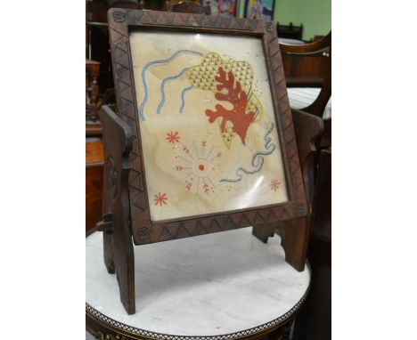 Ladybird man carved oak adjustable table/firescreen 