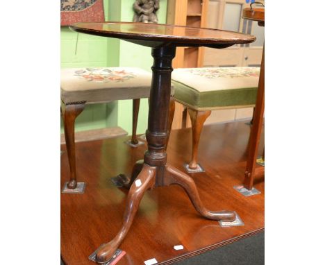 A Georgian mahogany tripod table with shell inlay 