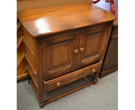 An Ercol side cabinet 