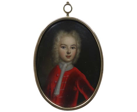English School c.1700 Portrait miniature of a boy, wearing a red coat and with powdered hair On copper, oval, in a gilt metal