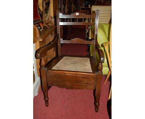 An Edwardian walnut commode chair; together with one other similar (2)