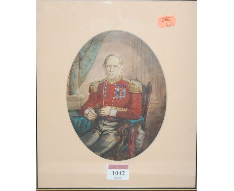 A 19th century overpainted portrait print of a decorated officer, seated in an interior, framed as an oval, 18 x 13cm