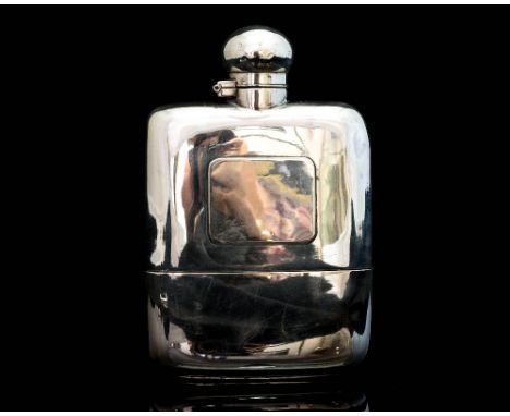 A Victorian silver hip flask, of cushioned form with detachable silver cup and screw top cap with bayonet fitting, hallmarks 