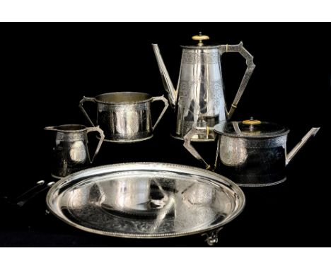 A Victorian cased silver five piece tea service, comprising coffee pot, teapot, milk jug, sugar bowl and salver, each with en