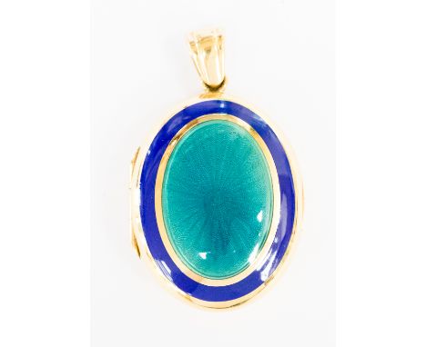 *Amended description* An enamelled 18ct yellow gold locket, the central oval turquoise-coloured guilloche enamel panel set wi