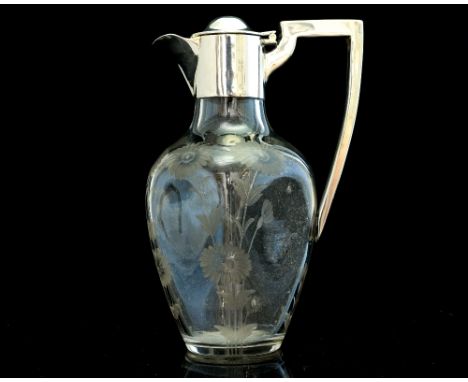 A Victorian glass and silver mounted oil or vinegar decanter, the tapering square glass body with etched sunflower decoration