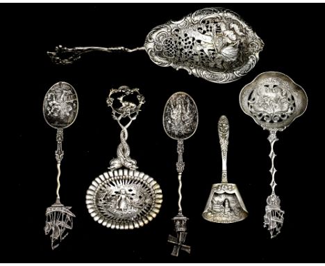 A Continental white metal spoon with fret worked bowl, London import mark for 1896, silver spoon with sailing ship finial wit
