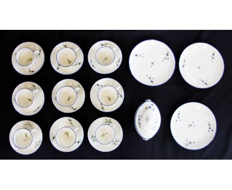 A Pinxton porcelain part tea set, number 13 pattern, including nine cups and saucers, three larger plates and a covered sucri