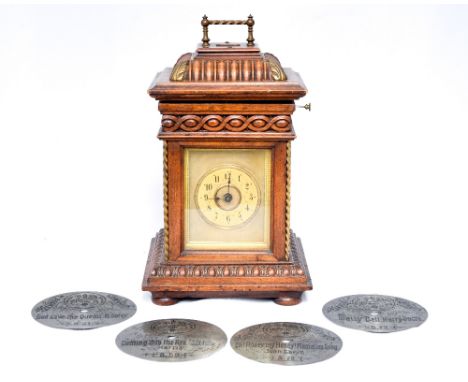A Junghans walnut bracket clock, circa 1880, architectural case, gilt framed dial, Arabic numerals, a polyphon incorporated i