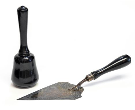 A Victorian boxed presentation trowel and mallet, the trowel with silver blade and turned ebony handle, with inscription "Pre