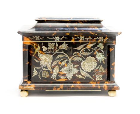 A Regency tortoiseshell tea caddy, circa 1820,  inlaid with mother-of-pearl floral and foliate devices, fitted interior for a