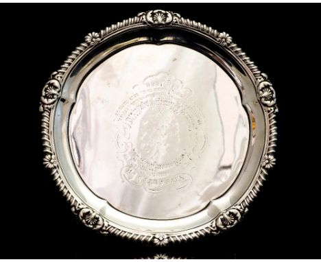 Paul Storr. A George III silver waiter, of circular form with gadrooned border applied with anthemions, atop four similar for