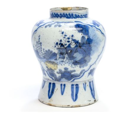 A Delft blue and white vase, circa 1750, waisted baluster form, decorated with cartouches of Oriental figures in garden lands