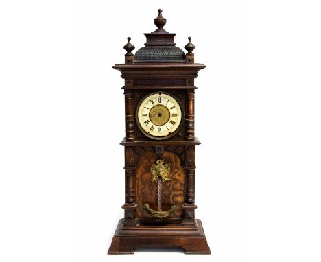 A late 19th century German walnut fountain clock, circa 1880, architectural case, 8cm Roman dial, simulated fountain below, h