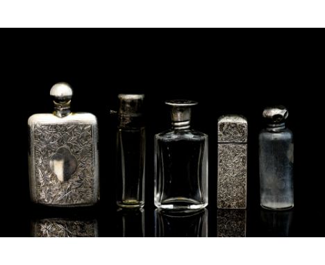 A Victorian Sampson Mordan silver square pillar shaped scent bottle with stopper, the exterior with engraved foliate decorati