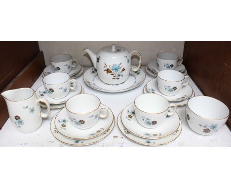 SECTION 4. A Royal Worcester Lucerne pattern tea set, comprising teapot, saucers, side plates, teacups, milk jug and sugar bo