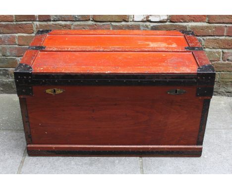 A stained wood, metal bound trunk, the hinged top opening to reveal a zinc-lined interior. The top stamped, 'The Marshall Pat