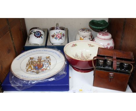 SECTION 30.  A set of four glass toilet bottles with silver-plated tops and in fitted brown leather travelling case, stamped 