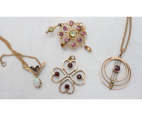 A 9ct gold clover pendant set with four garnets, together with a 9ct gold opal pendant on yellow metal chain, another 9ct gol