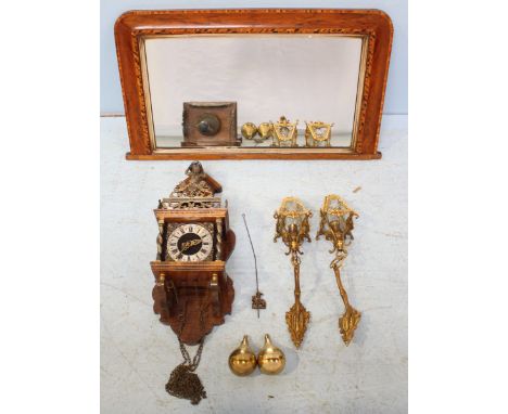 A 19th Century walnut over-mantel mirror with parquetry decoration, 72cm wide, together with a wooden and brass hanging wall 