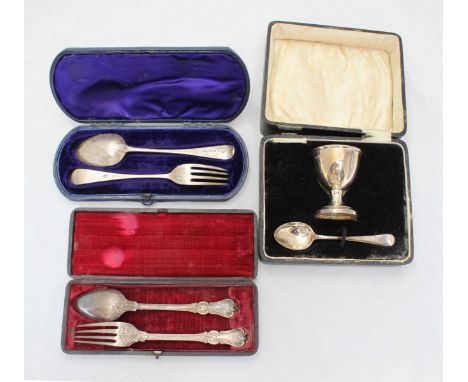 Two various Victorian cased silver fork & spoon christening sets, together with a George V cased silver egg & spoon christeni