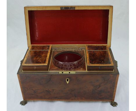 A 19th century Burr yew and boxwood strung tea caddy of rectangular form, the top opening to reveal two fitted tea cannisters