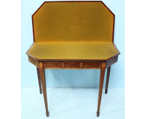 A George III flame-mahogany and satinwood-crossbanded folding card table, of rectangular form with canted corners, rear hinge