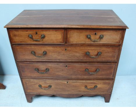 A late 19th century mahogany chest of two short and three long graduated oak-lined drawers with brass handles & escutcheons, 