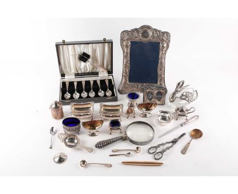 A collection of small silver and plated items in including a pair of boat form silver pedestal salts London 1891 by The Gold 