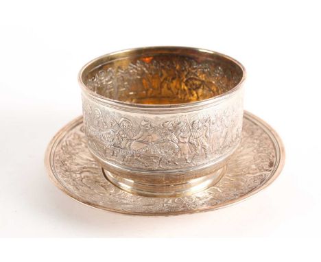 A Tiffany sterling silver fingerbowl and saucer. Bearing the managers letter "T" for 1892-1902. Each bearing a panoramic scen