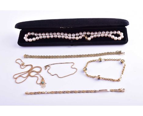 An 18ct yellow gold fancy flat-link chain bracelet, marked 750, 17.5 cm long, together with an 18ct yellow gold brick-link br