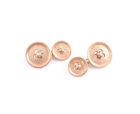 A pair of American button cufflinks, with large and small textured button-style plaques; chain link connections, and stamped 